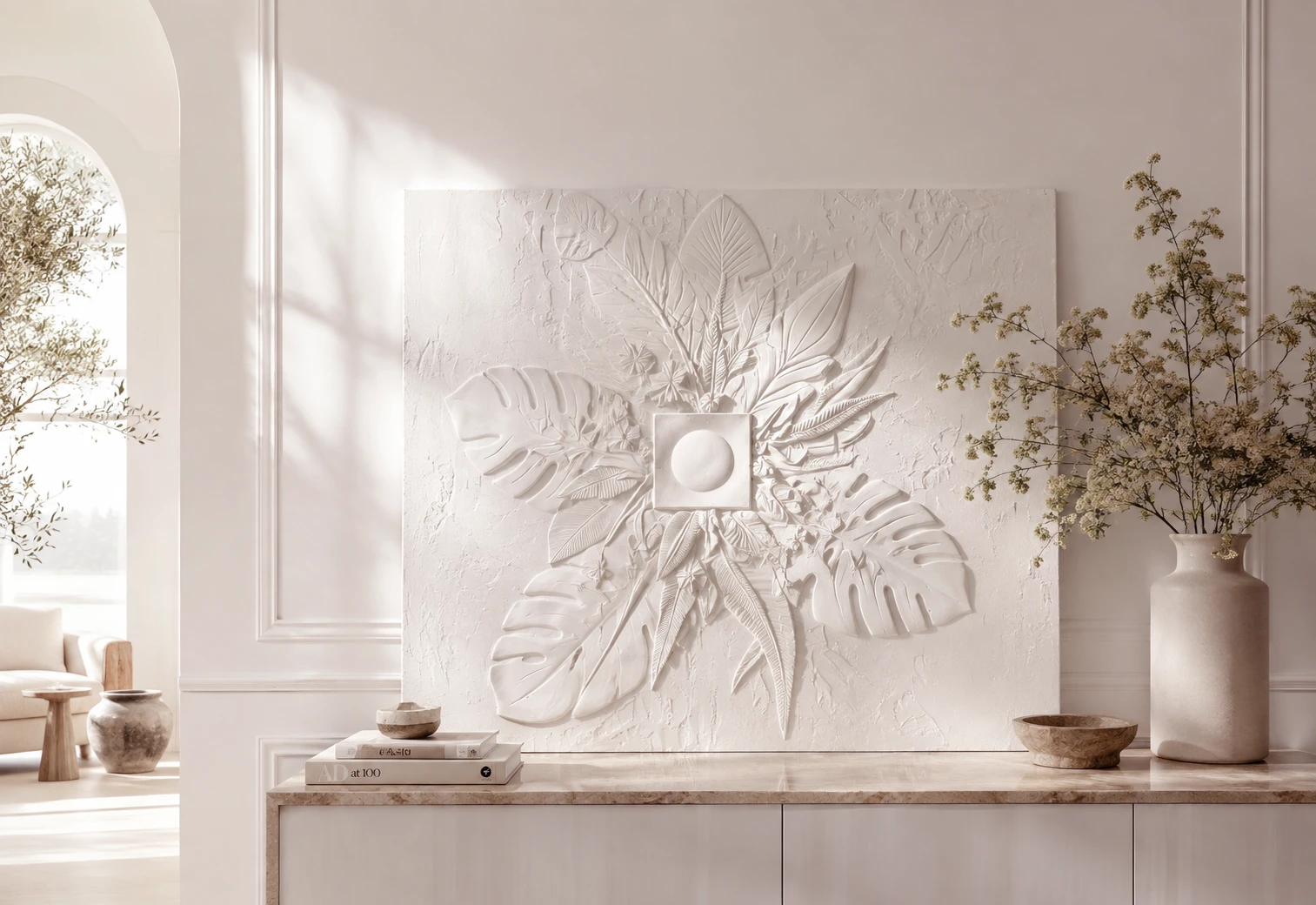 White sculptural bas-relief wall panels with symmetrical botanical forms by AnaKleo Studio